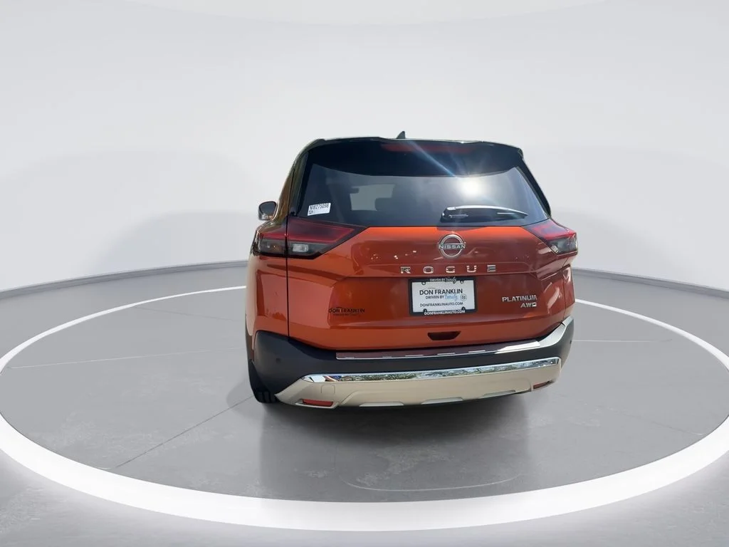 Used 2022 Orange Nissan Platinum image 7