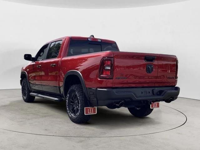 New 2026 Molten Red Ram REBEL CREW CAB 4X4 5