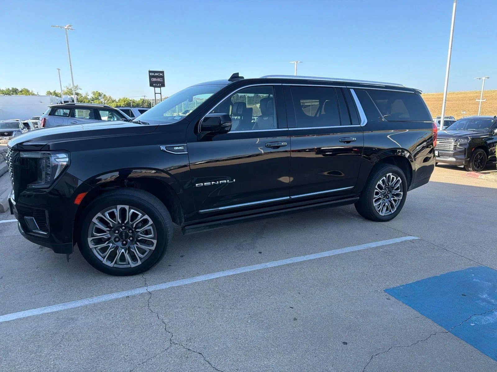 Used 2023 ONYX BLACK GMC Denali Ultimate image 1