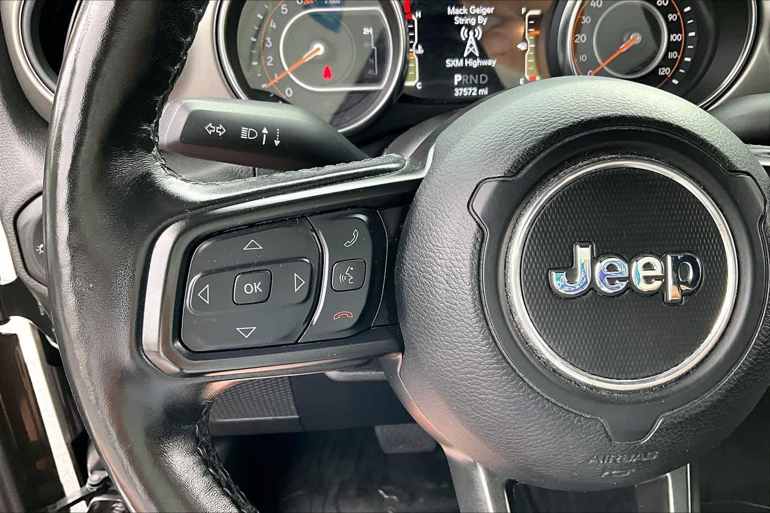 Used 2021 Granite Crystal Metallic Clearcoat Jeep Unlimited Sport S image 22