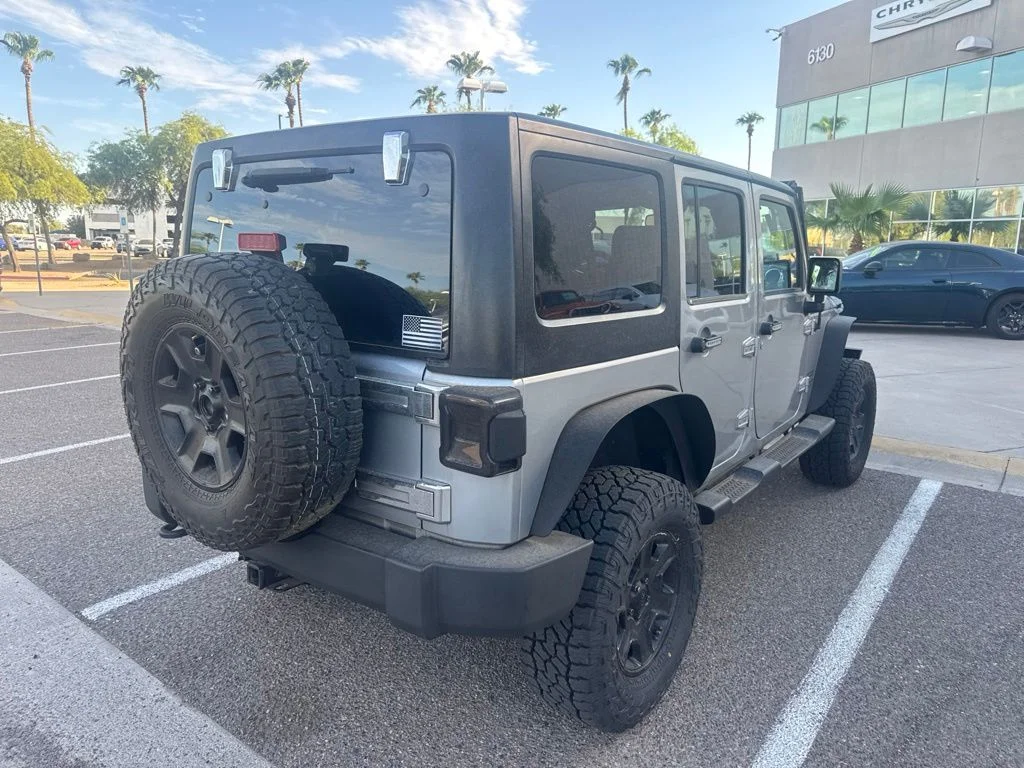 Used 2016 Silver Jeep Unlimited Sport image 4