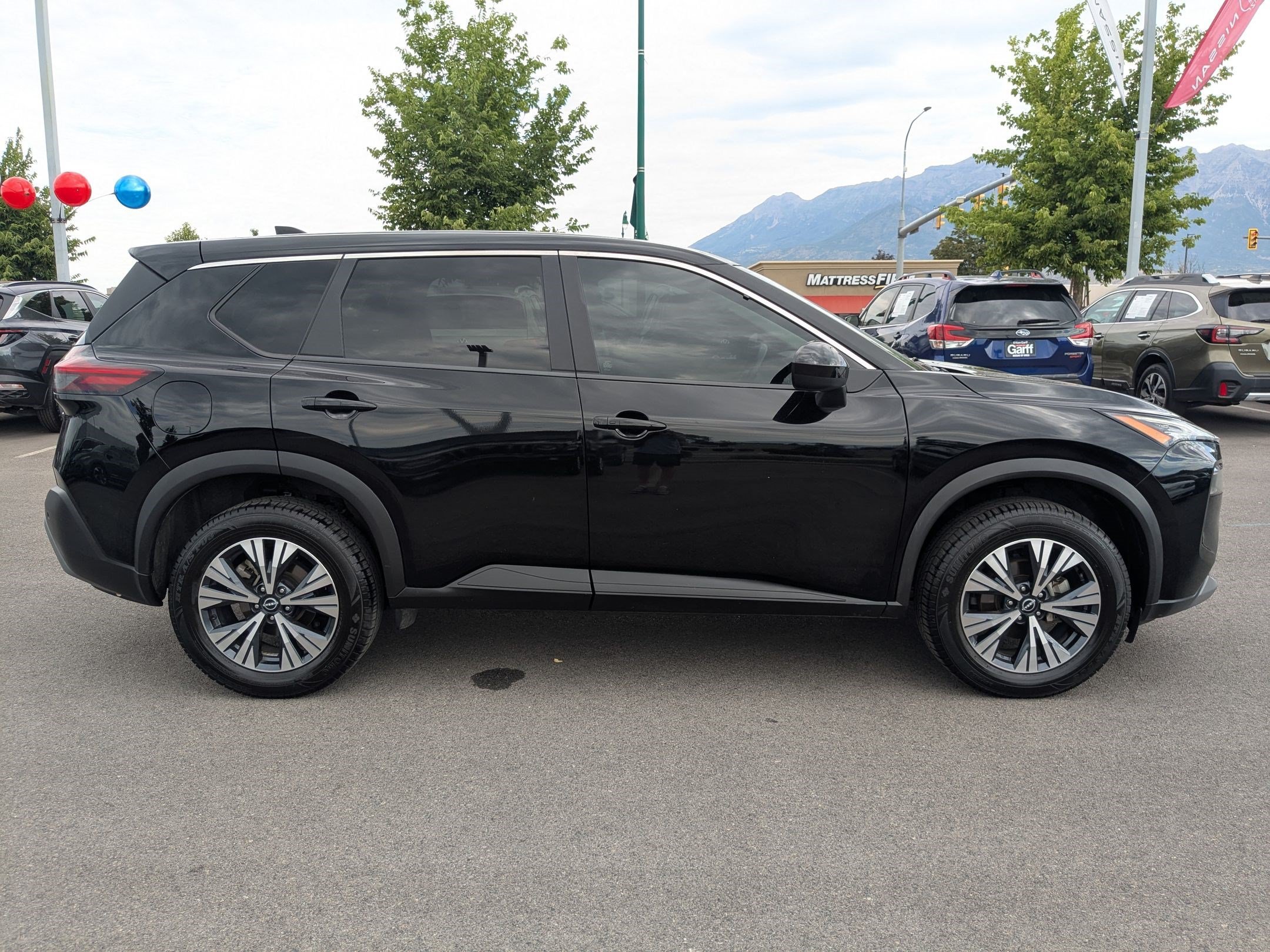 Used 2023 Super Black Nissan SV image 2