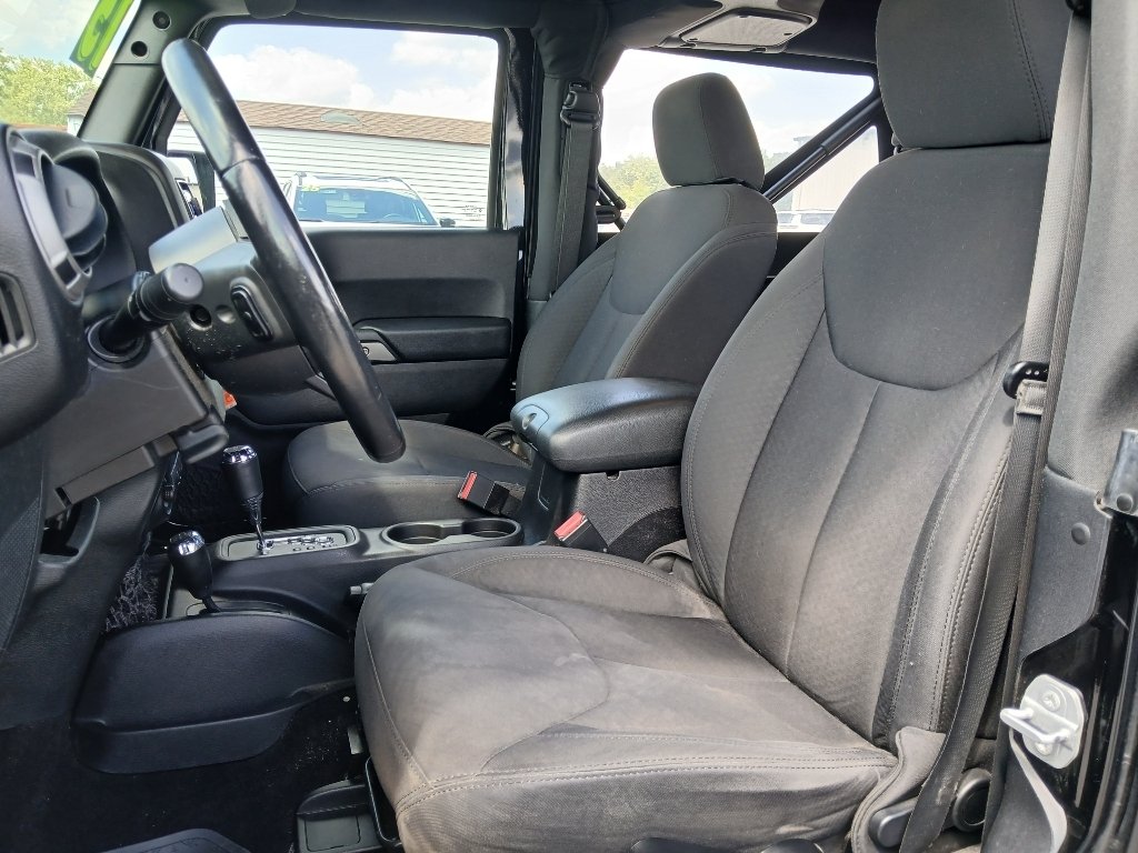 Used 2015 Black Clearcoat Jeep Sport image 10