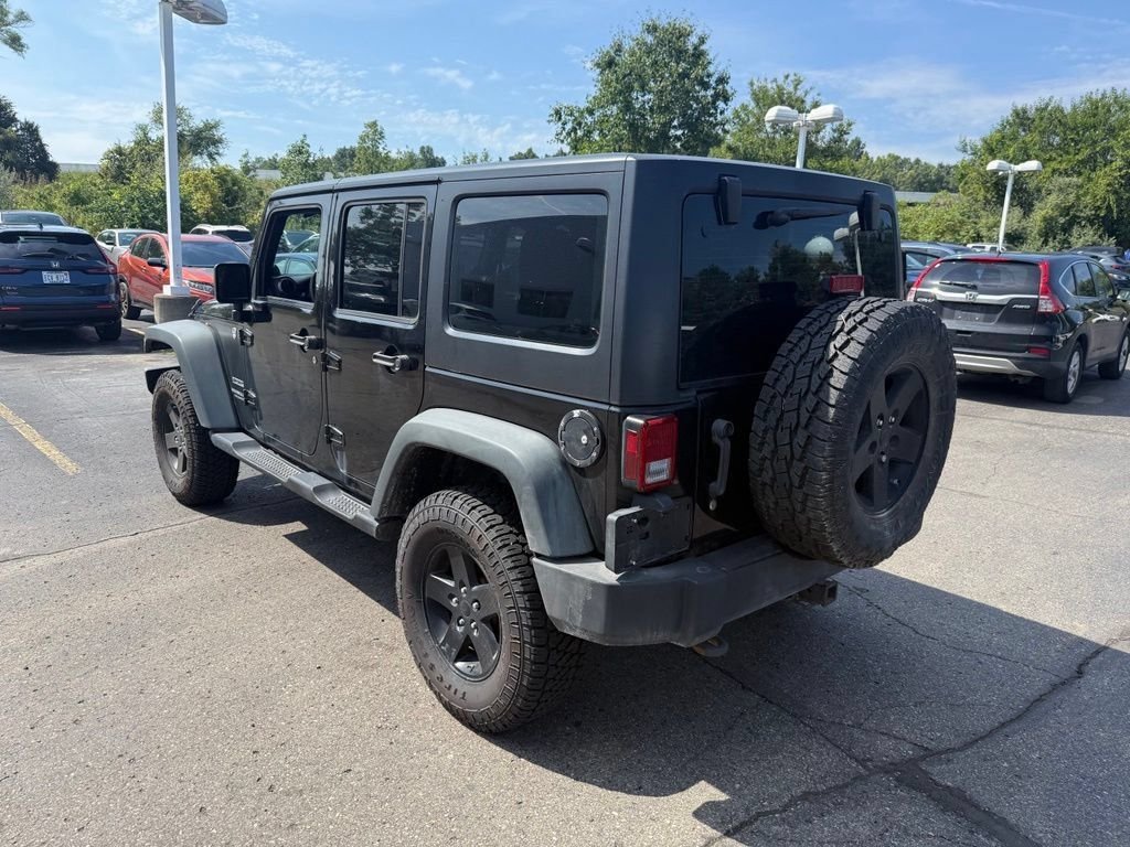 Used 2011 Jeep Wrangler Unlimited Sport with VIN 1J4BA3H15BL578983 for sale in Brighton, MI