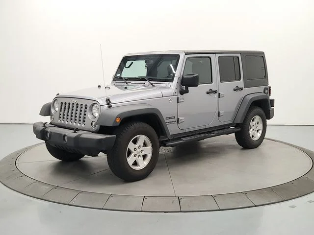 Used 2015 Silver Jeep Unlimited Sport image 4
