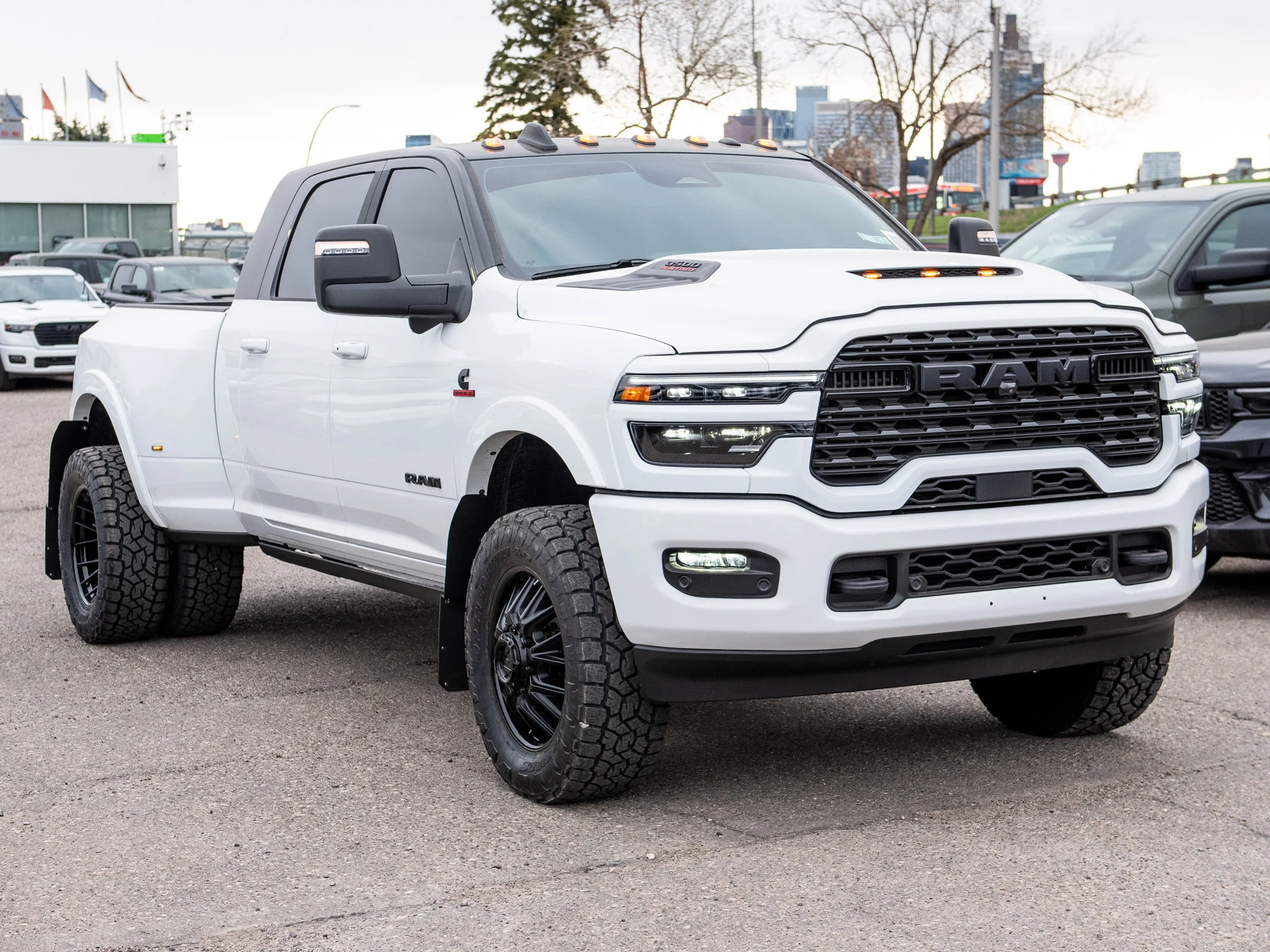 New 2026 White RAM Limited* Mega Cab, 2 Inch Lift, 35 Inch Tires, Fuel Wheels image 14