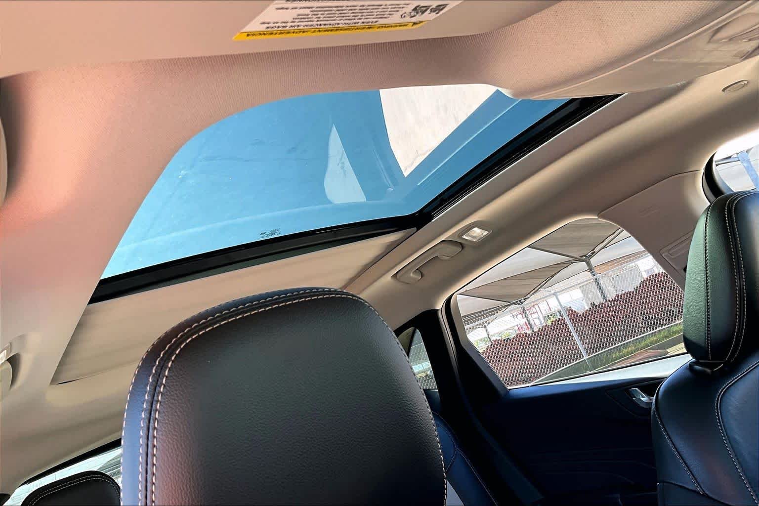 Used 2022 Agate Black Metallic Ford Titanium image 13