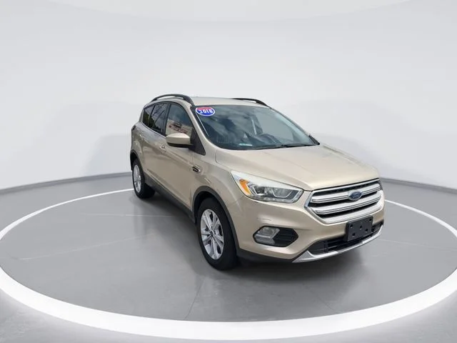 Used 2018 Gold Ford SEL image 1