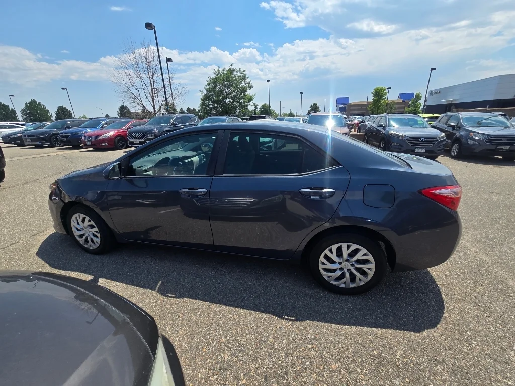 Used 2019 Slate Metallic Toyota LE image 2