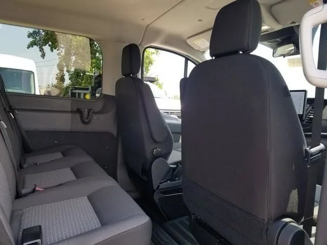 New 2026 Oxford White Ford Passenger Van XLT image 7