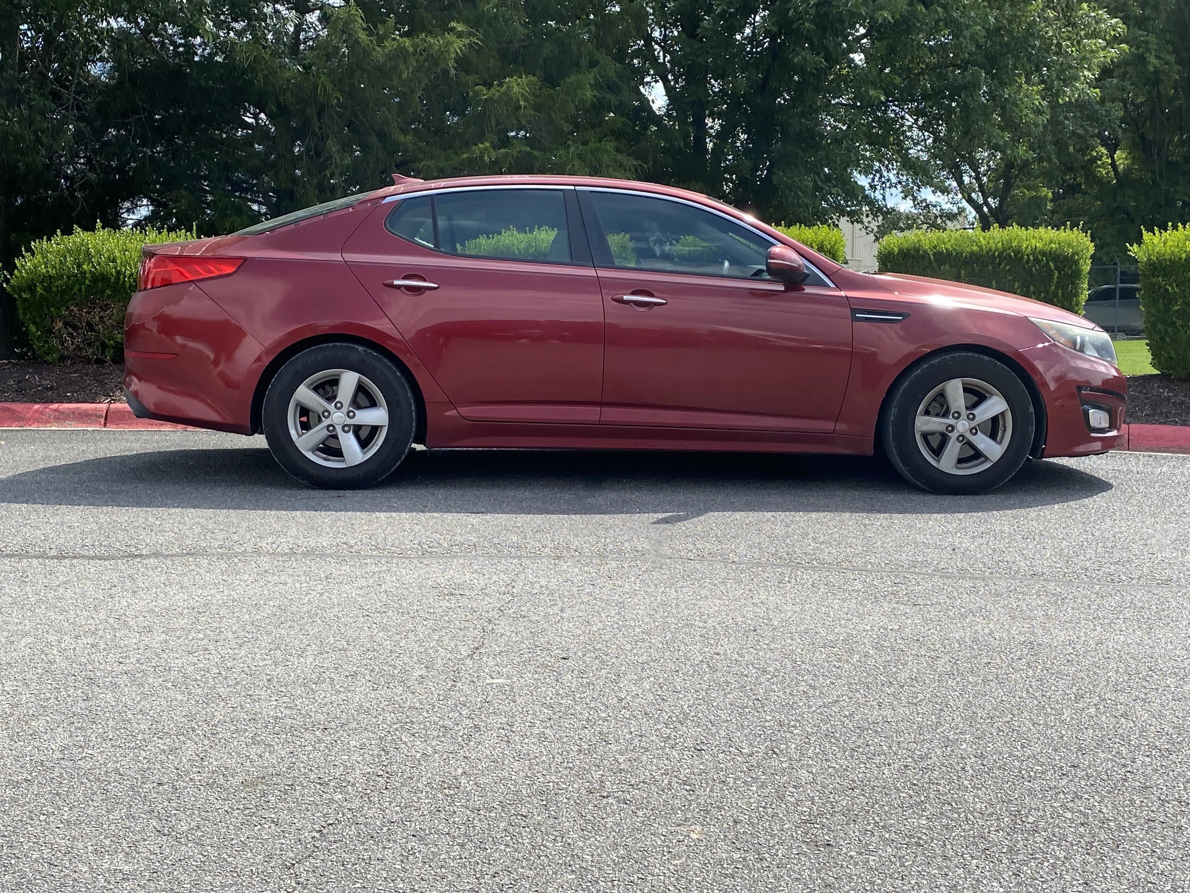 Used 2014 Remington Red Metallic Kia LX image 2