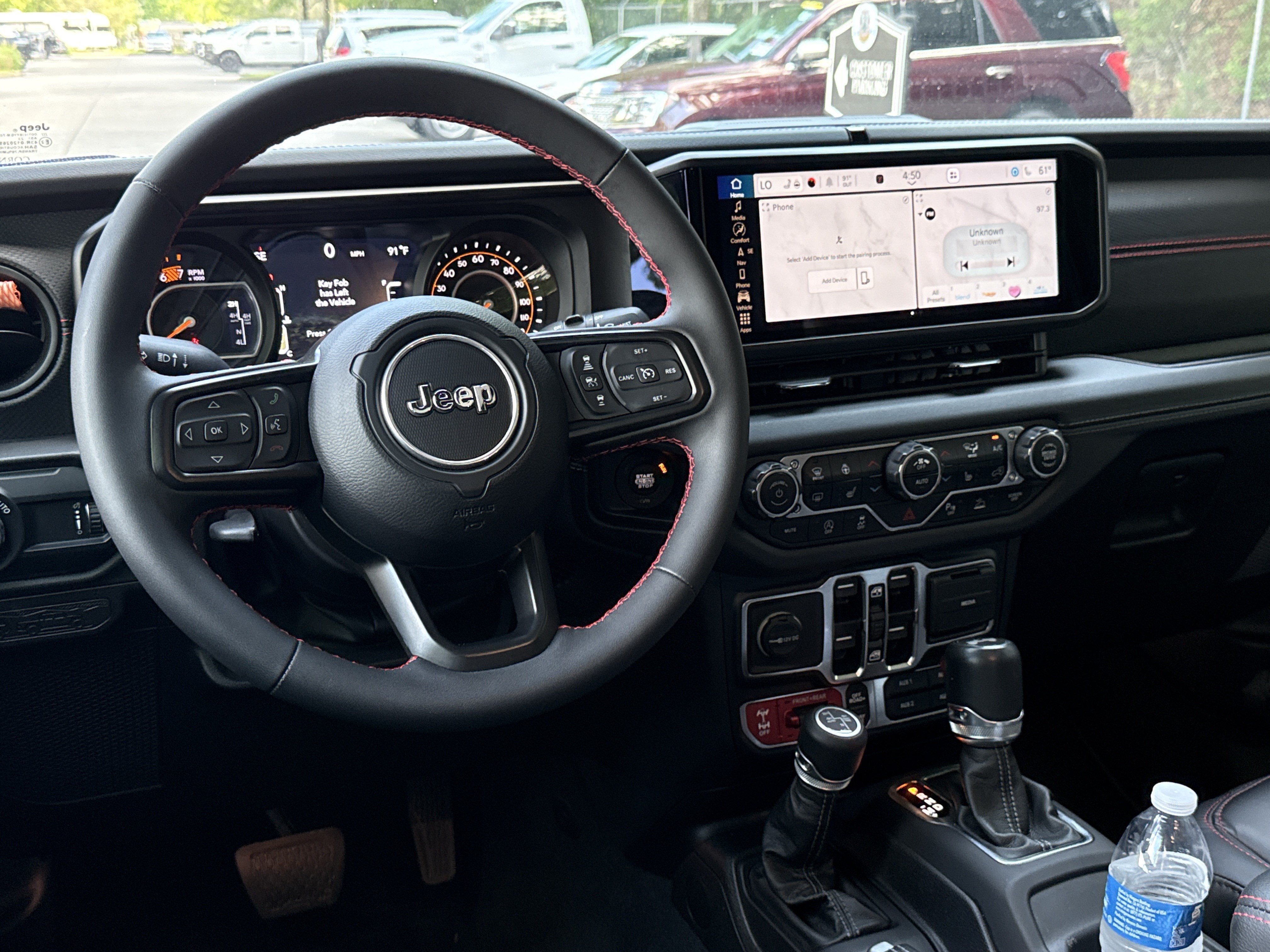 Used 2024 Hydro Blue Pearlcoat Jeep Rubicon X image 24