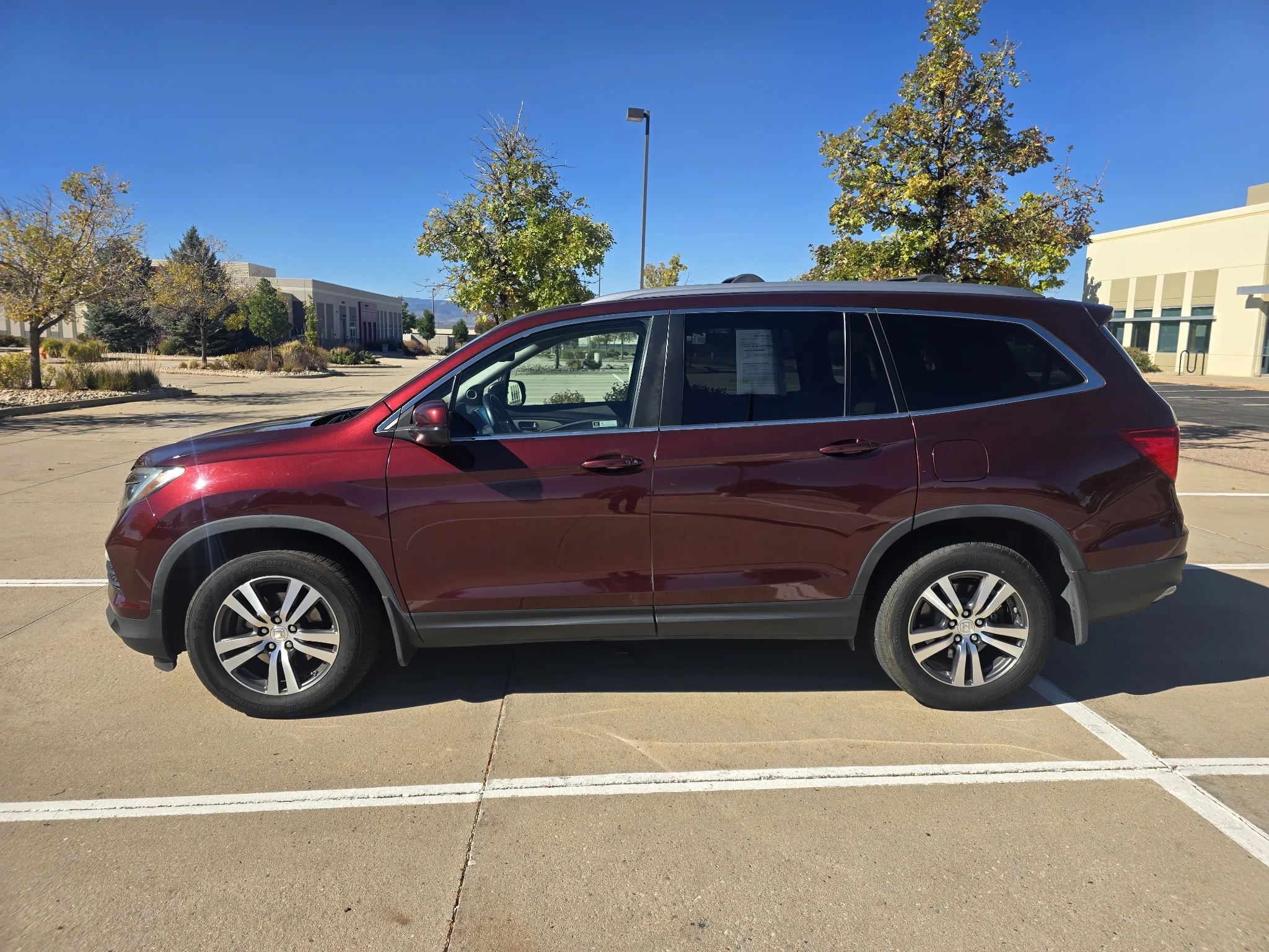 Used 2018 Honda Pilot EX-L with VIN 5FNYF6H61JB006244 for sale in Loveland, CO