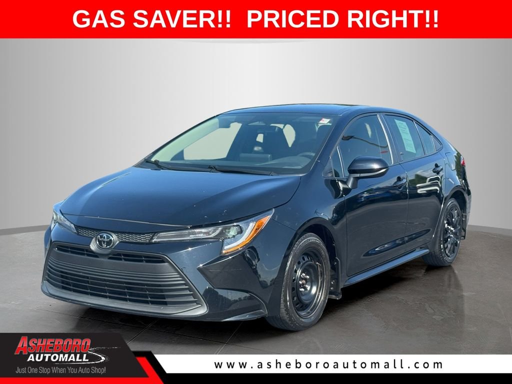 Used 2025 Black Toyota LE image 1