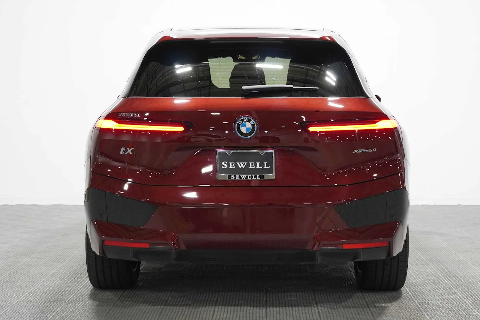 Certified Used 2024 Aventurin Red Metallic BMW xDrive50 image 5