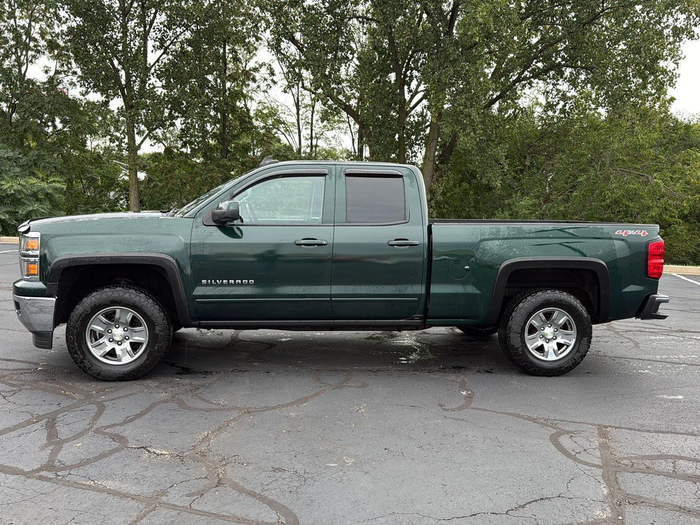 Used 2015 RAINFOREST GREEN METALLIC Chevrolet LT image 2