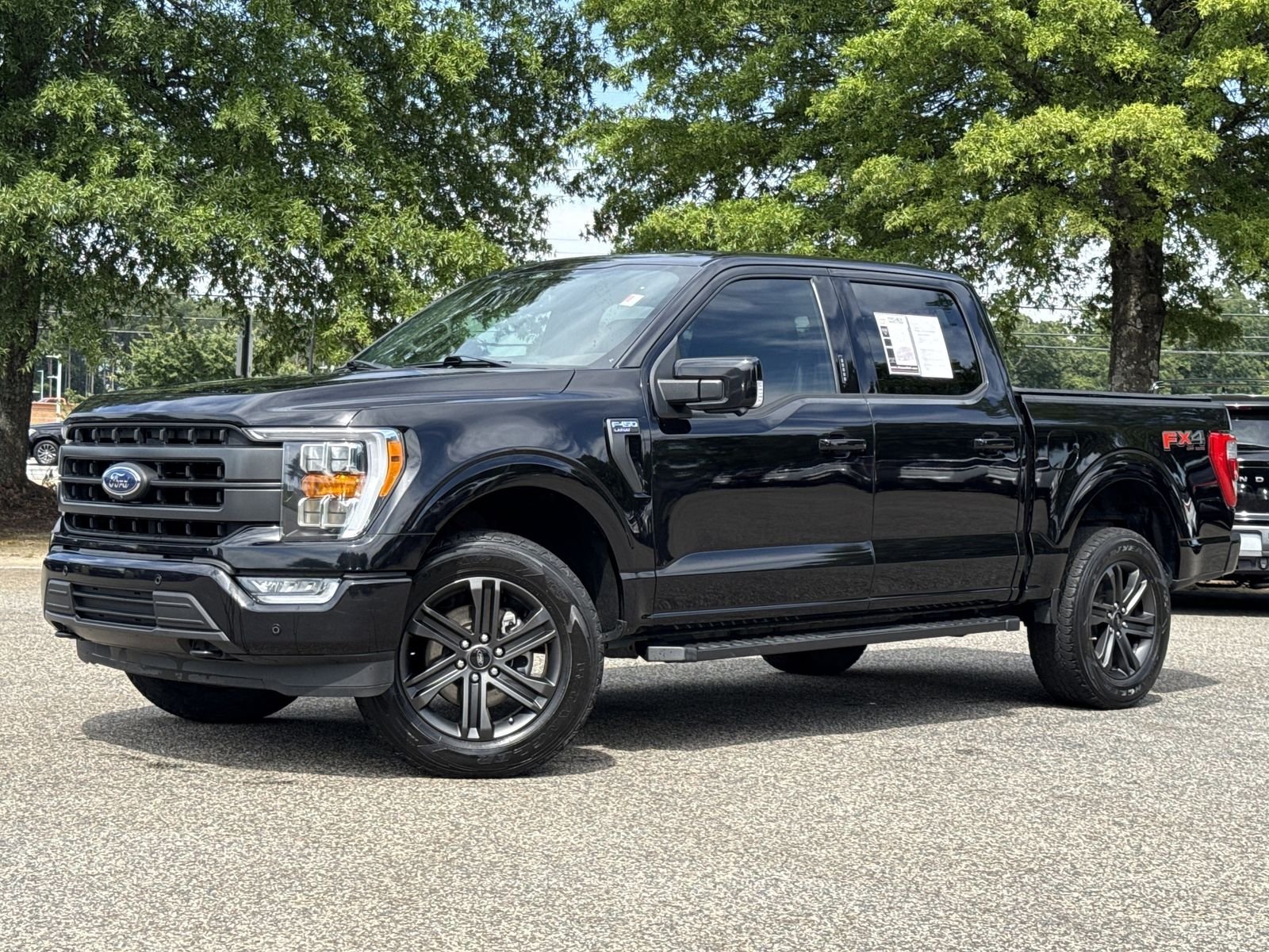 Used 2021 Black Ford Lariat image 1