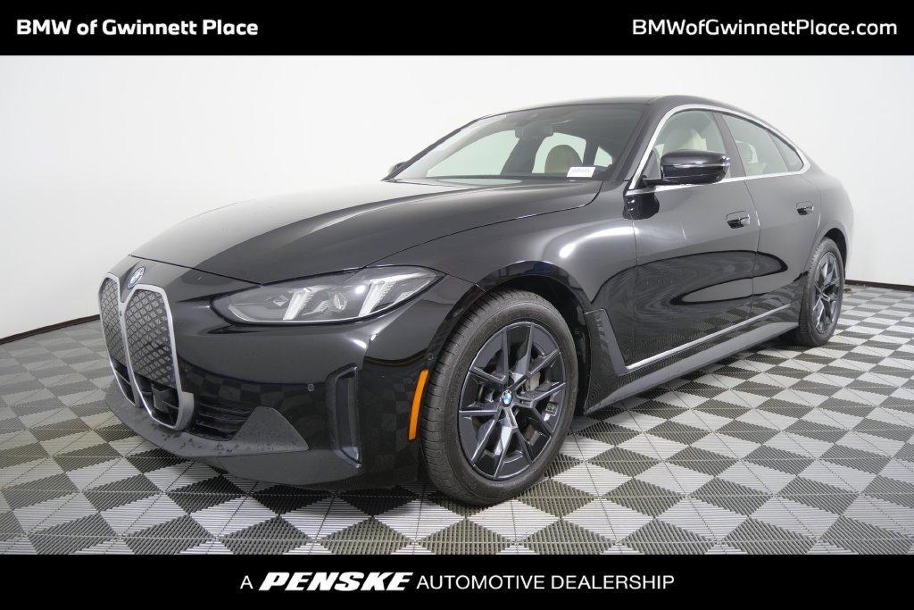 Certified Used 2025 Jet Black BMW eDrive40 image 1