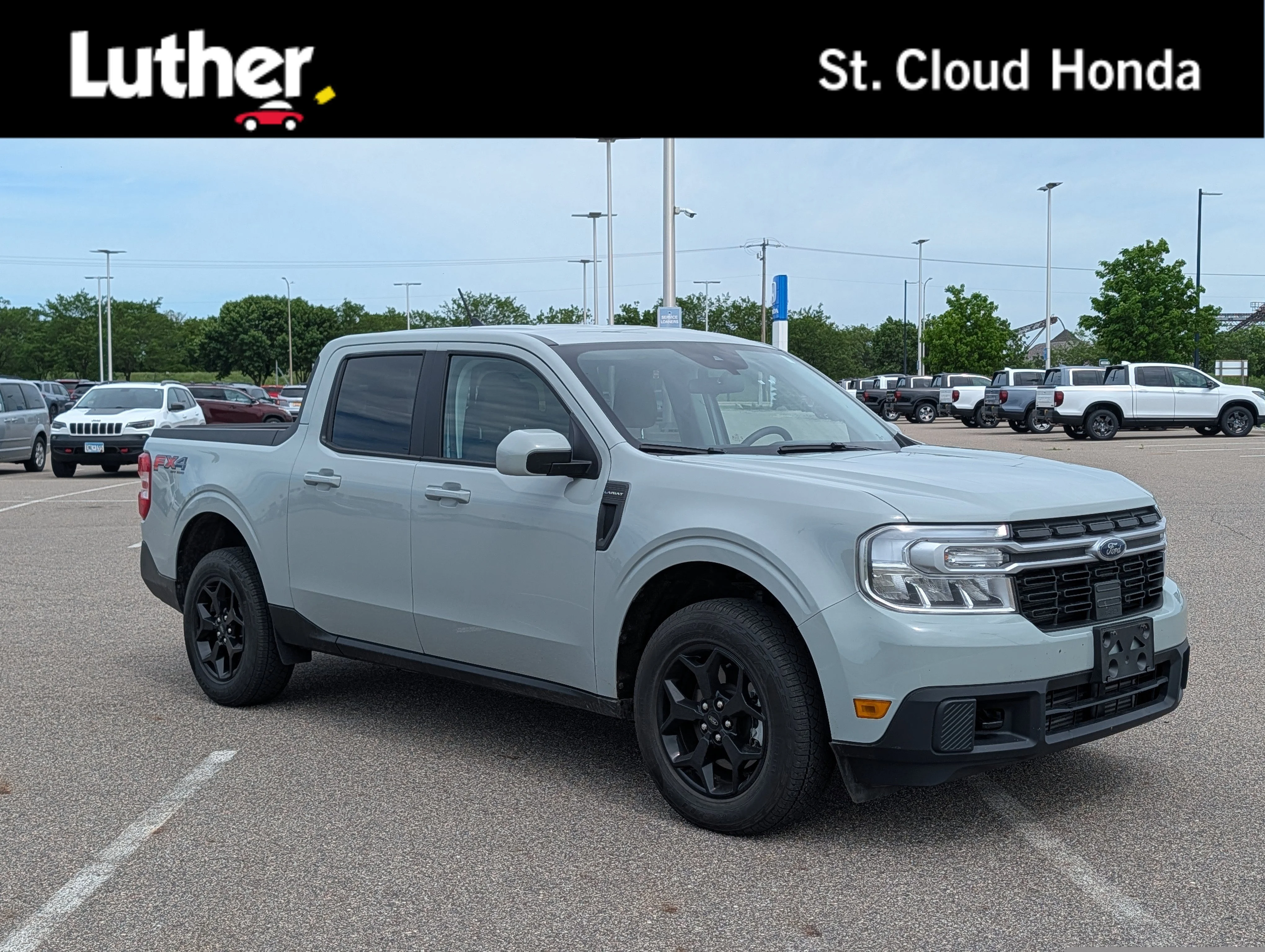 Used 2023 Cactus Gray Ford LARIAT image 1