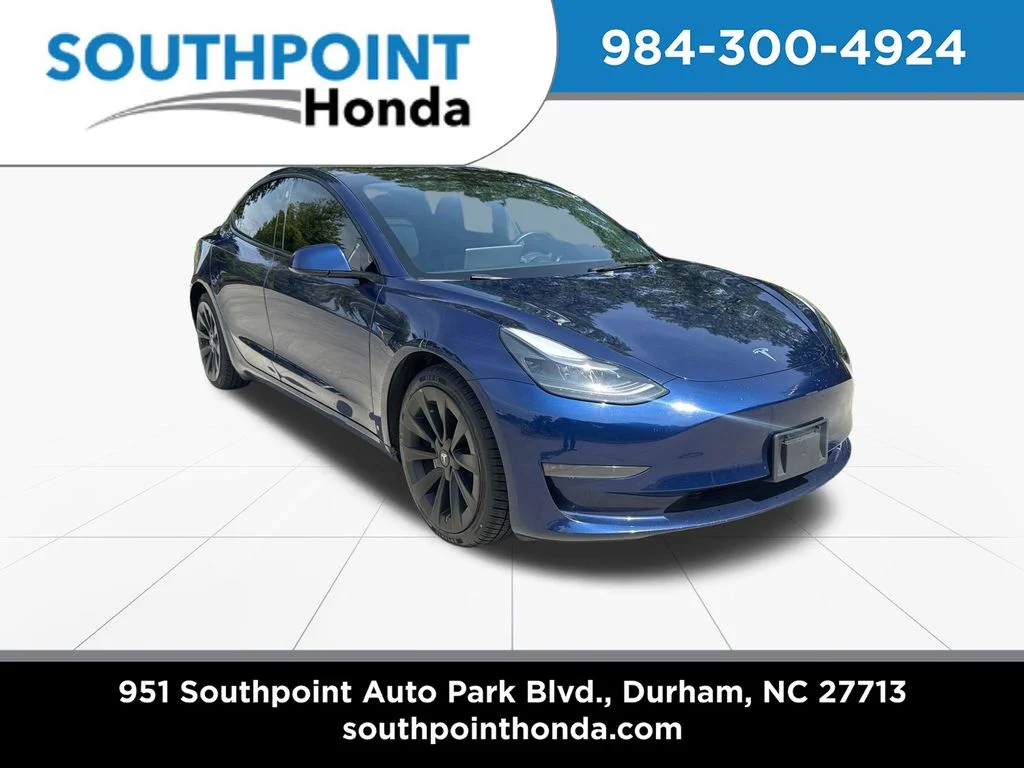 Used 2023 Deep Blue Metallic Tesla Base image 1