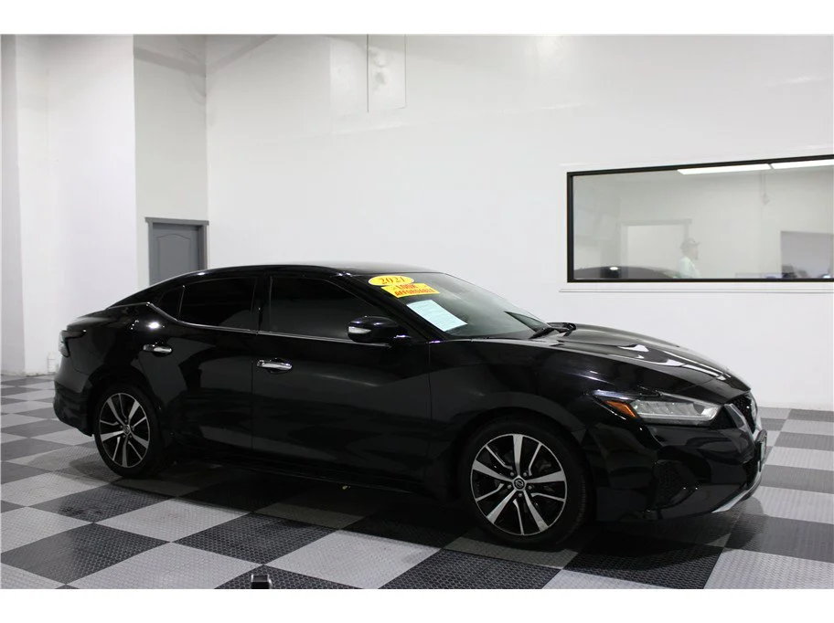 Used 2021 Super Black Nissan SV image 1