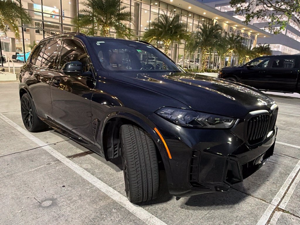 Certified Used 2024 Black Sapphire Metallic BMW xDrive40i image 5