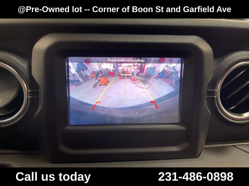 Used 2018 Orange Jeep Unlimited Sahara image 25