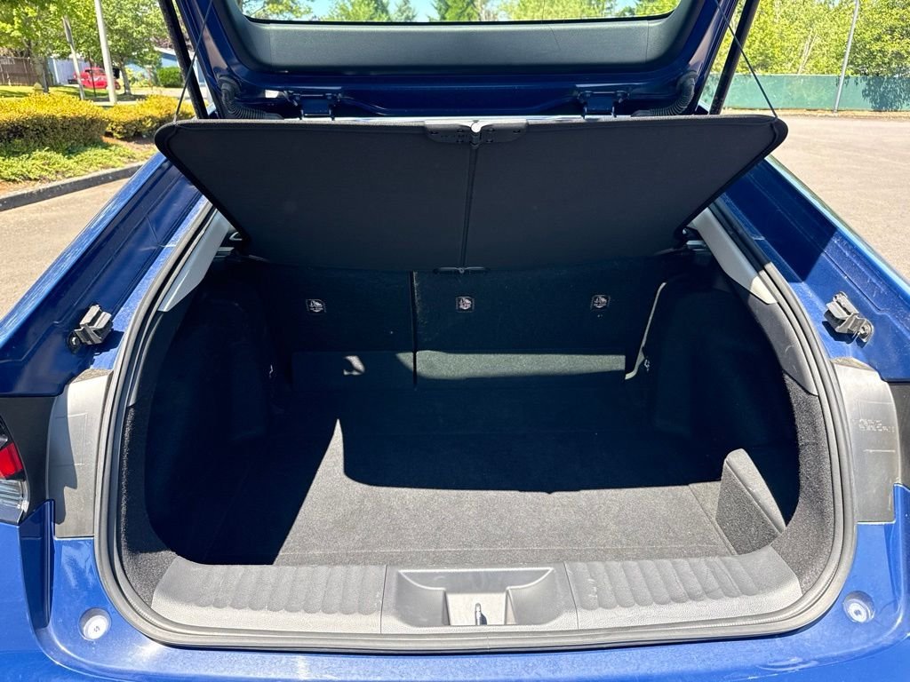 Used 2025 Reservoir Blue Toyota LE image 21