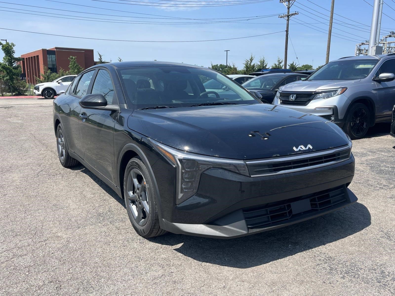 New 2026 Aurora Black Pearl Kia LXS image 1