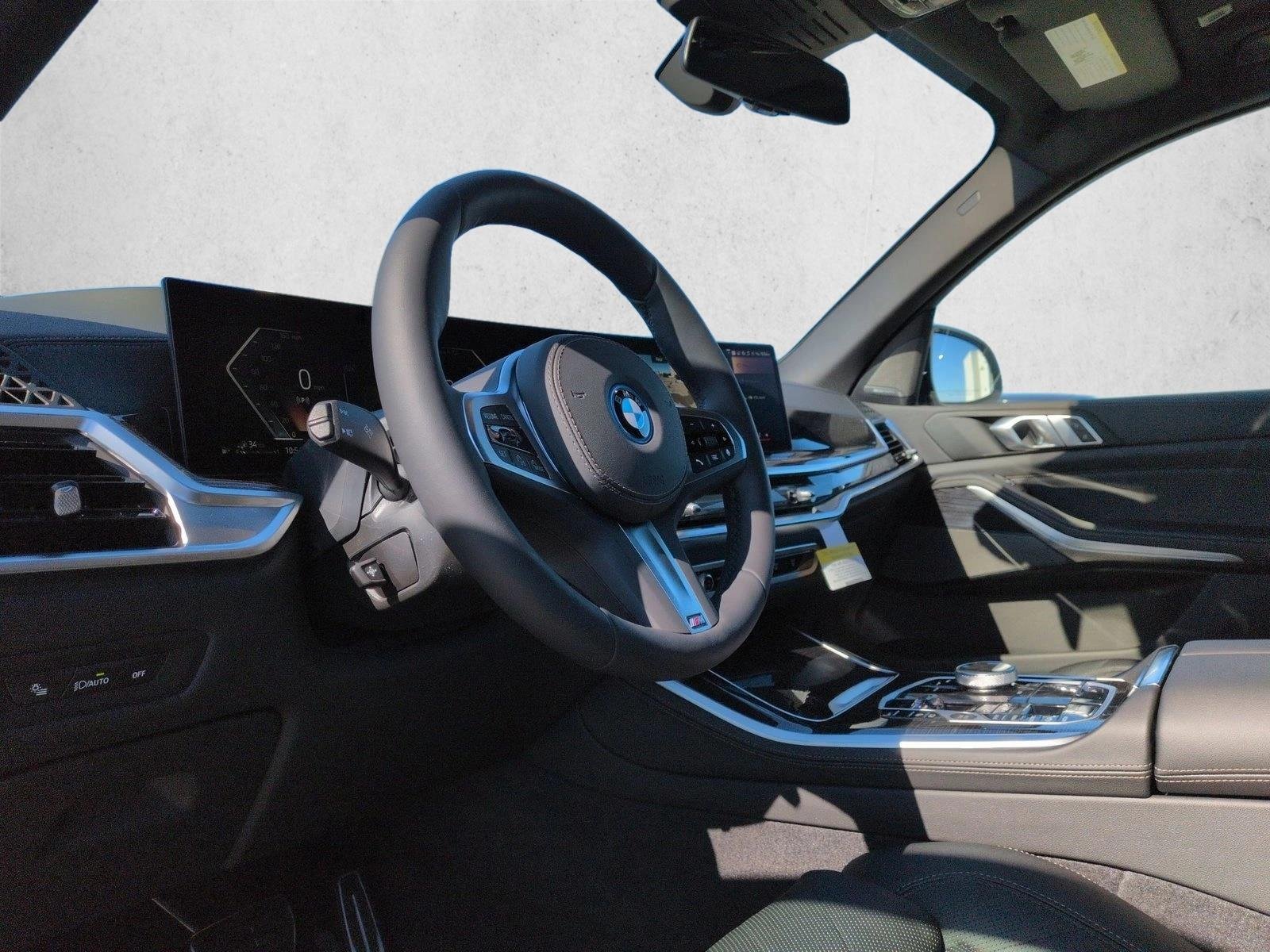 Used 2026 Mineral White Metallic BMW xDrive50e image 3