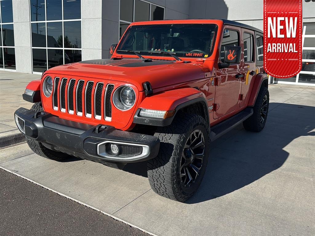 Used 2023 Orange Jeep Unlimited Sahara image 1