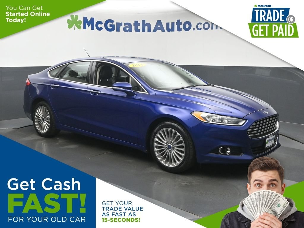 Used 2014 Blue Ford Titanium image 1