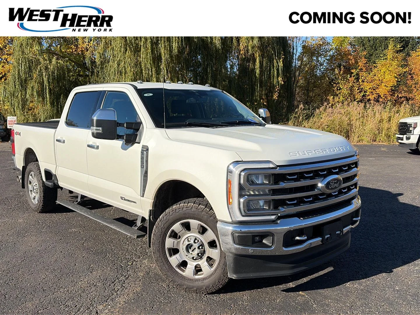 Used 2023 Star White Metallic Tri-Coat Ford Lariat image 1
