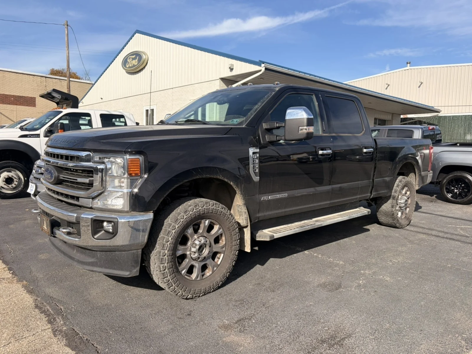 Used 2022 Agate Black Metallic Ford LARIAT image 1