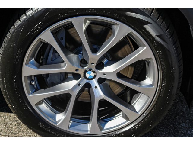 New 2026 Black Sapphire Metallic BMW xDrive50e image 8