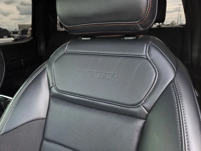 Used 2024 Blue Metallic Ford Raptor image 16