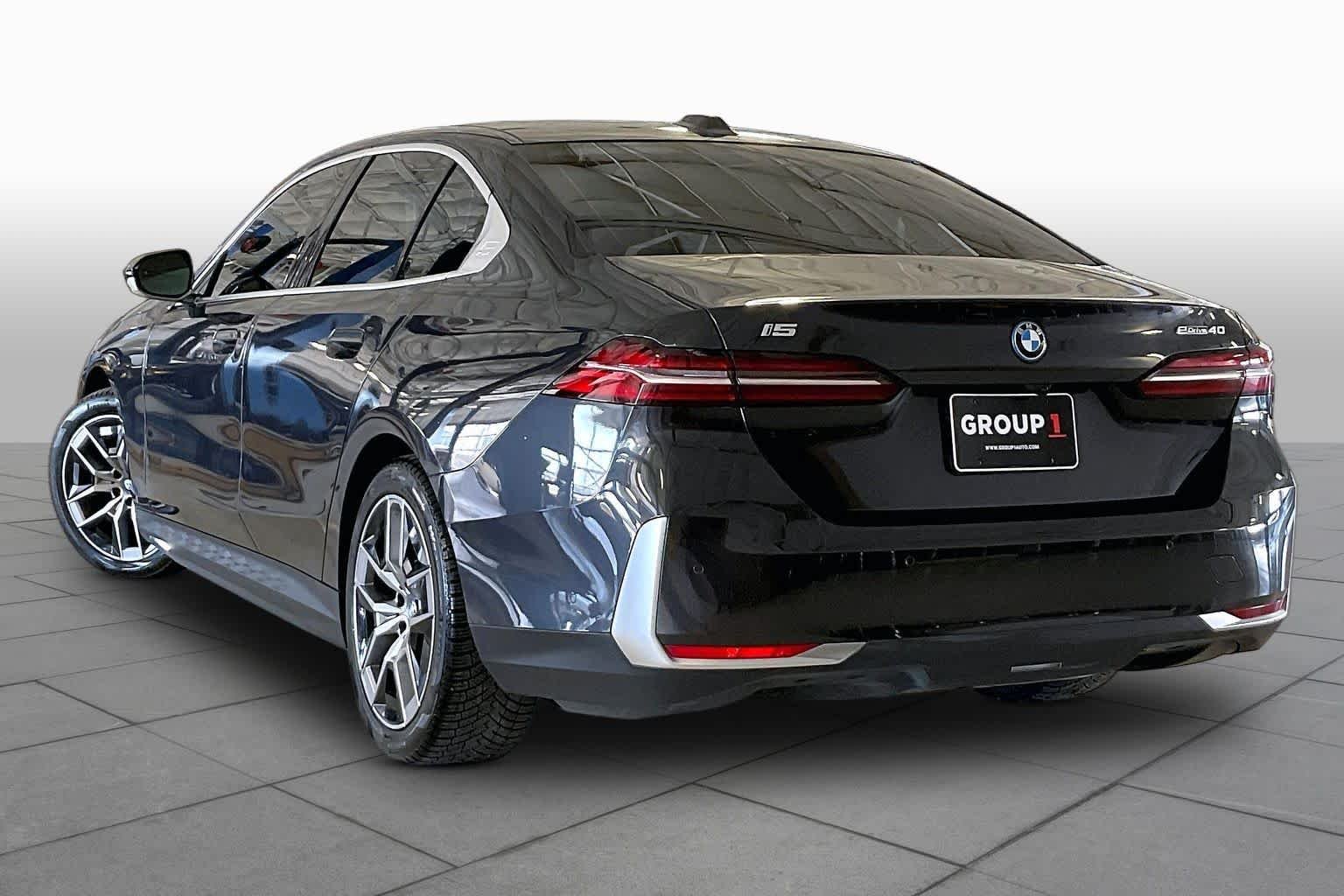 Certified Used 2024 Dark Graphite Metallic BMW eDrive40 image 11
