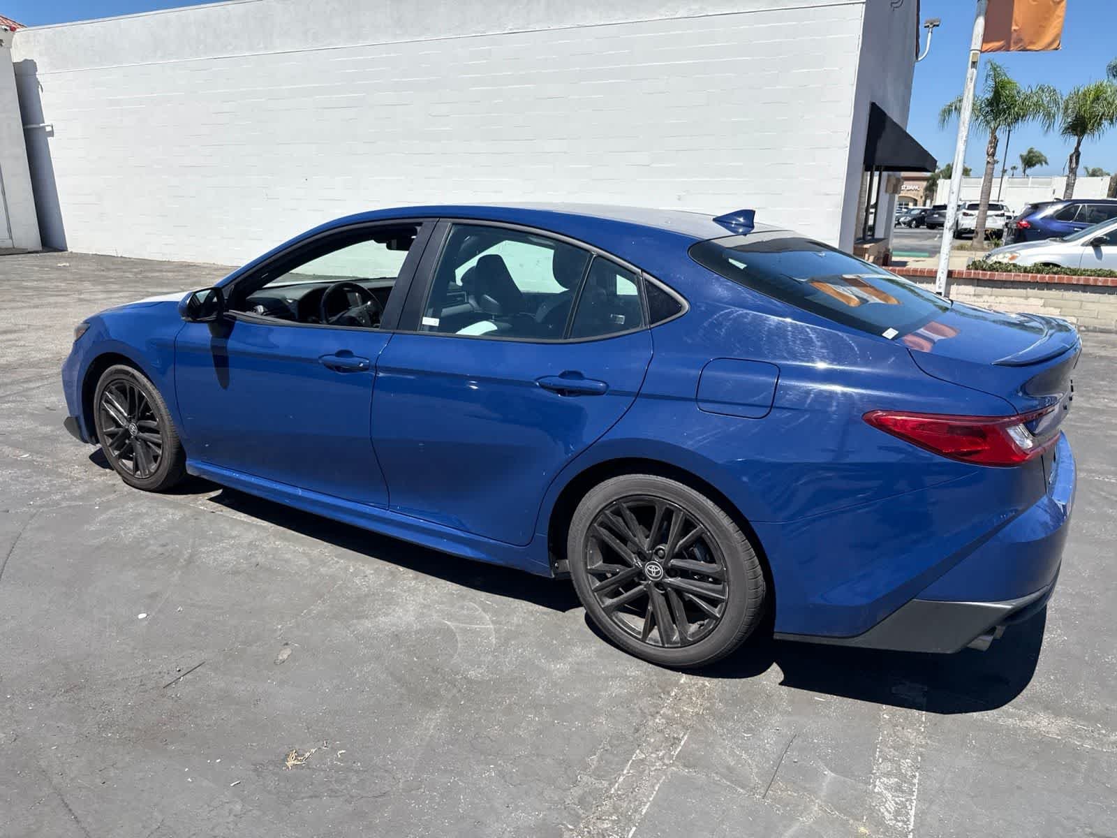 Used 2025 Reservoir Blue Toyota SE image 21