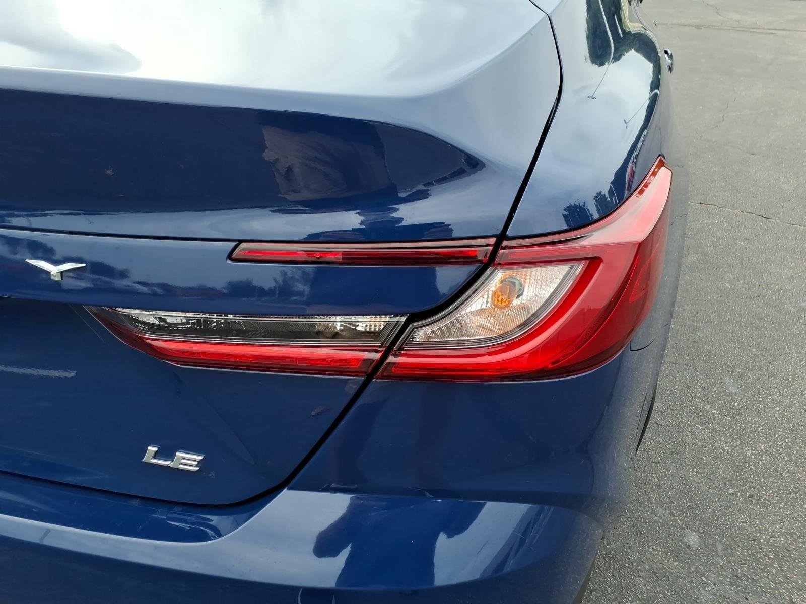 Used 2025 Reservoir Blue Toyota LE image 18
