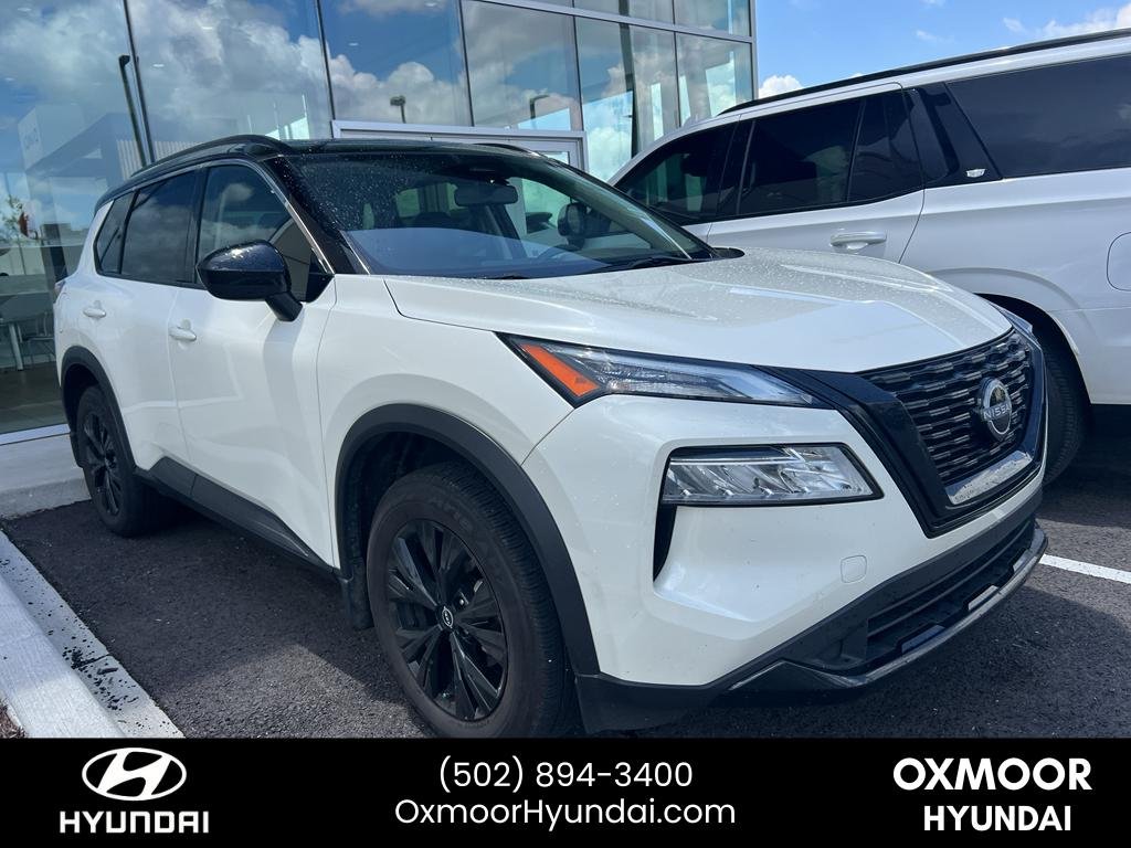 Used 2023 Pearl White Tricoat/Super Black Nissan SV image 1