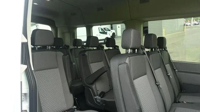 New 2026 Oxford White Ford Passenger Van XLT image 8