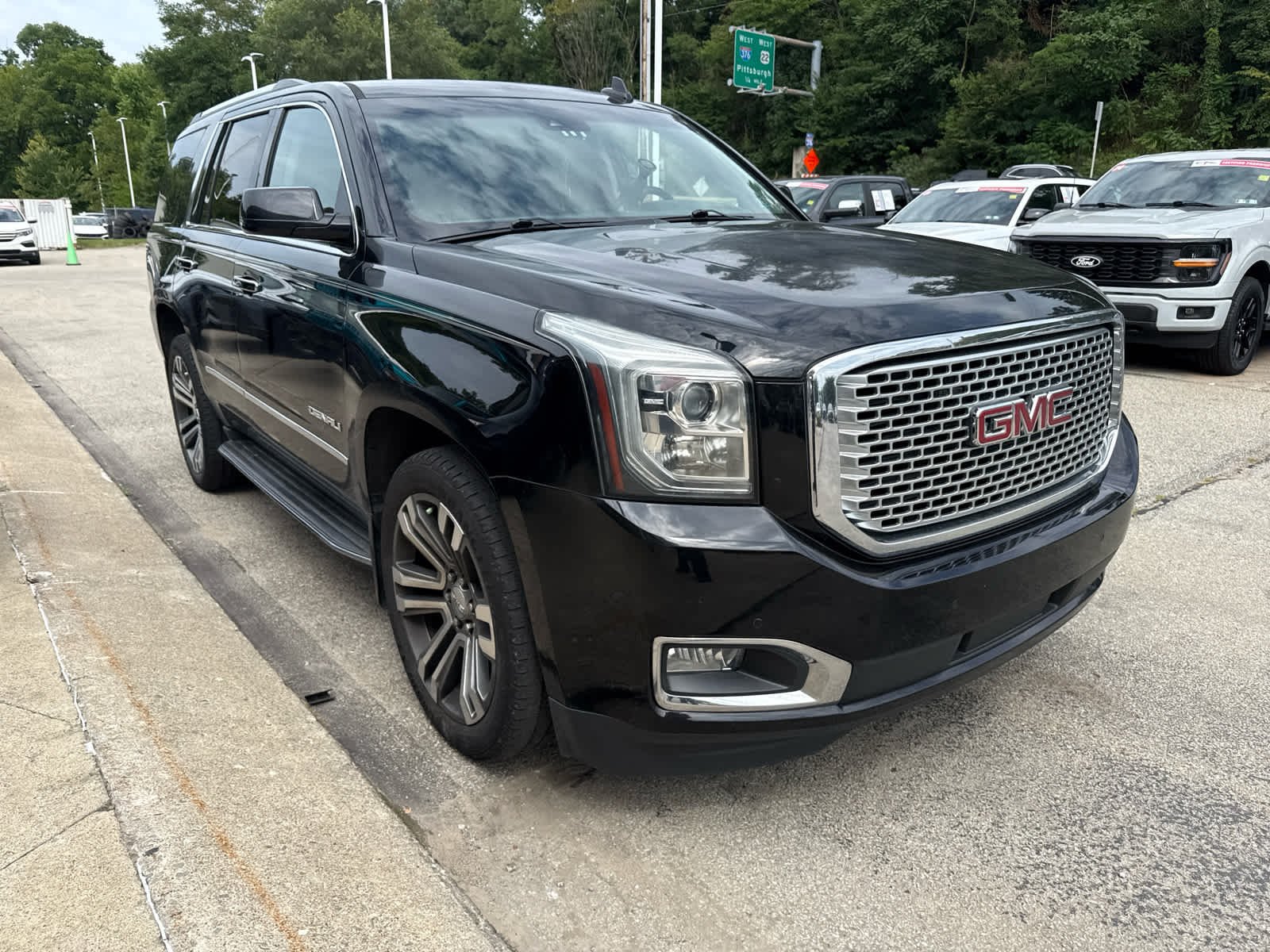 Used 2017 ONYX BLACK GMC Denali image 1
