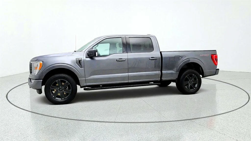 Used 2023 Carbonized Gray Metallic Ford XLT 4WD SuperCrew 6.5