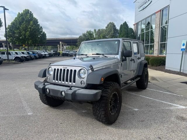 Used 2015 Jeep Wrangler Unlimited Sport with VIN 1C4BJWDG2FL698926 for sale in Collierville, TN