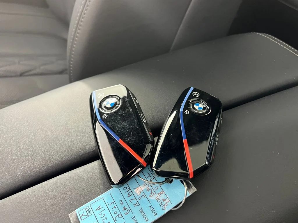 Certified Used 2025 Black Sapphire Metallic BMW M60i image 27