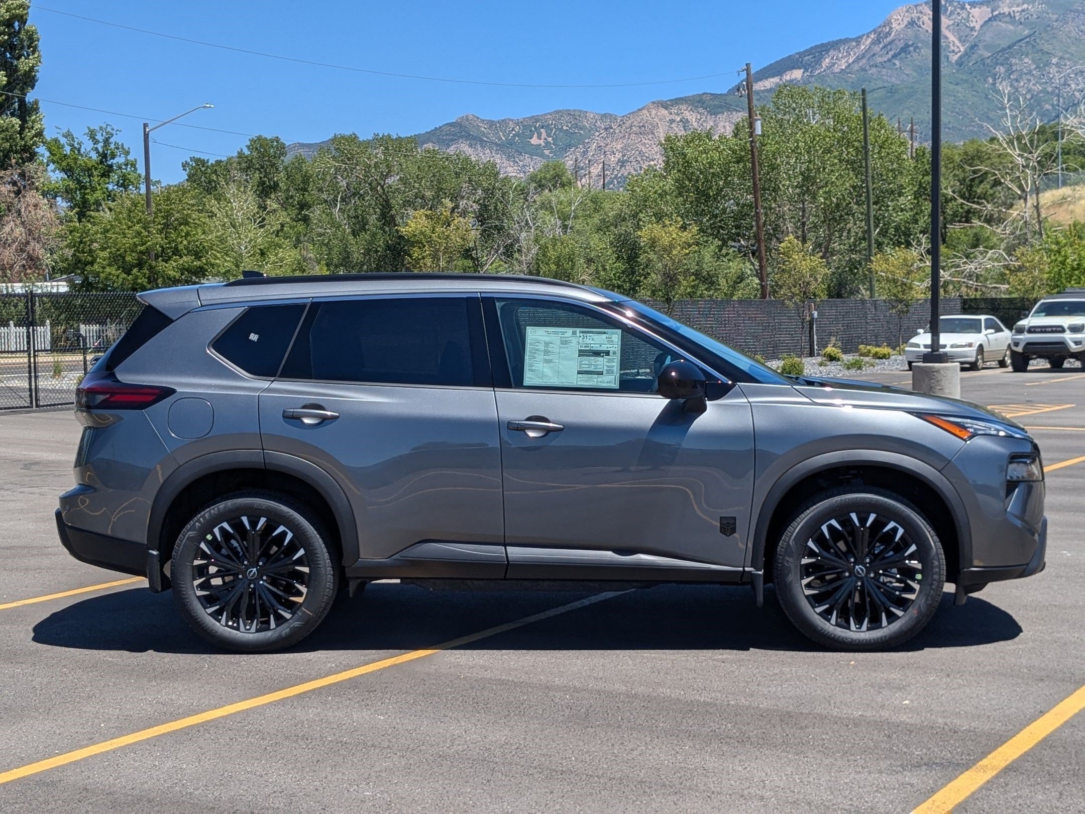 New 2026 Gun Metallic Nissan Dark Armor image 2