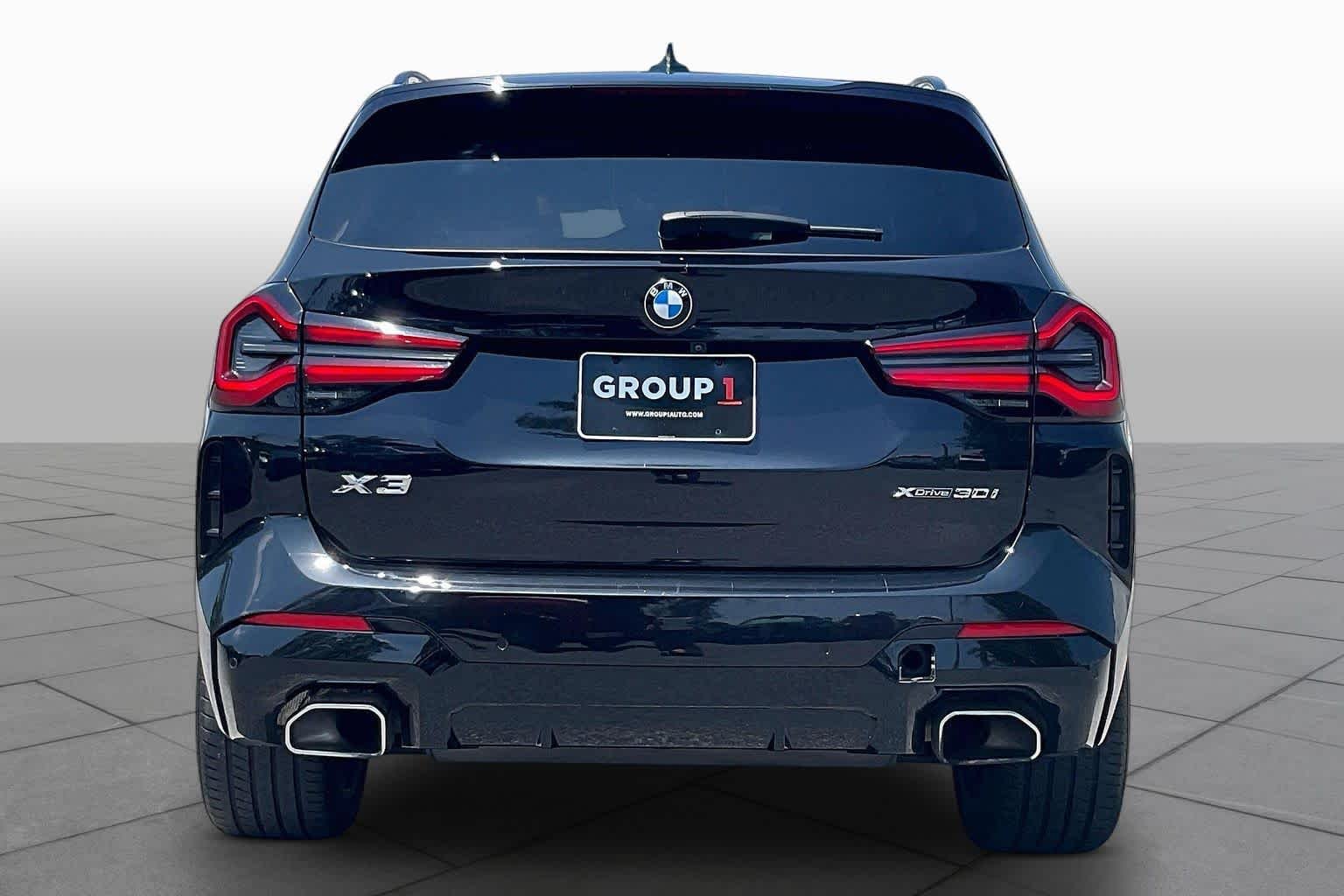 Used 2022 Black Sapphire Metallic BMW xDrive30i image 4