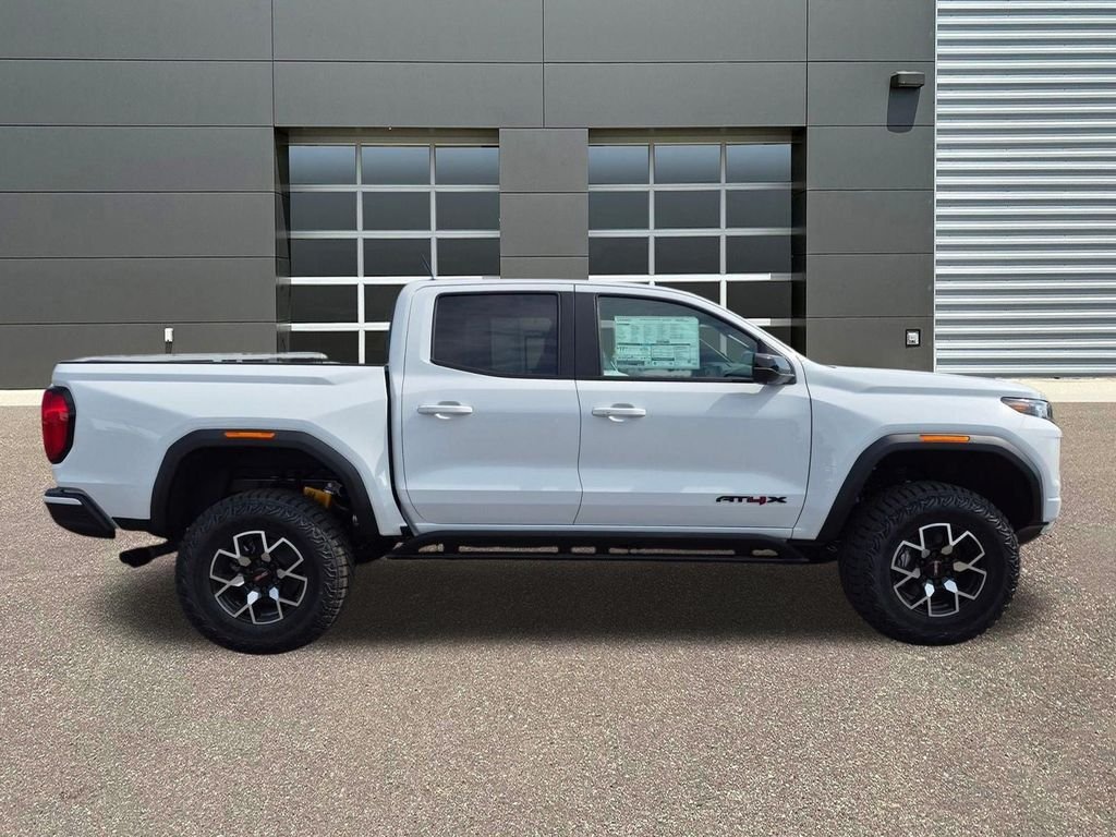 New 2026 Summit White GMC 4WD AT4X image 4