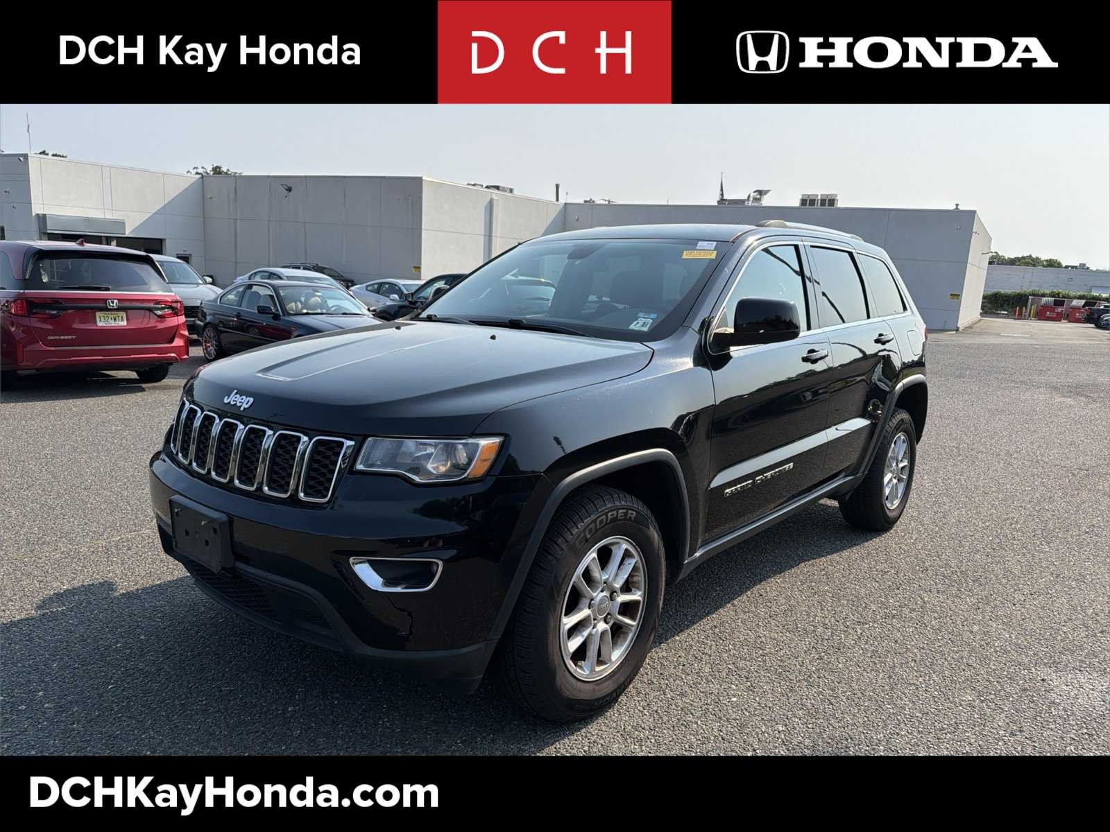 Used 2018 Diamond Black Crystal Pearlcoat Jeep Laredo E image 1