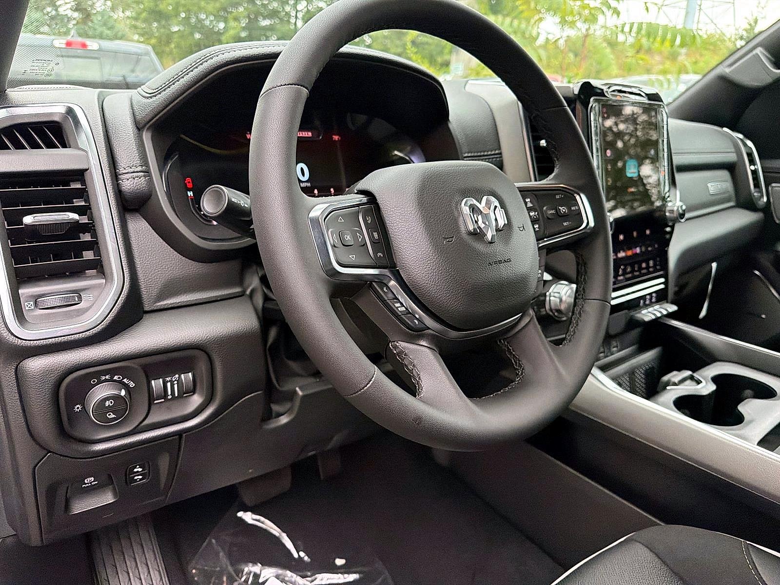 New 2027 Diamond Black Crystal Pearl-Coat Exterior Paint RAM Laramie Crew Cab 4x4 5